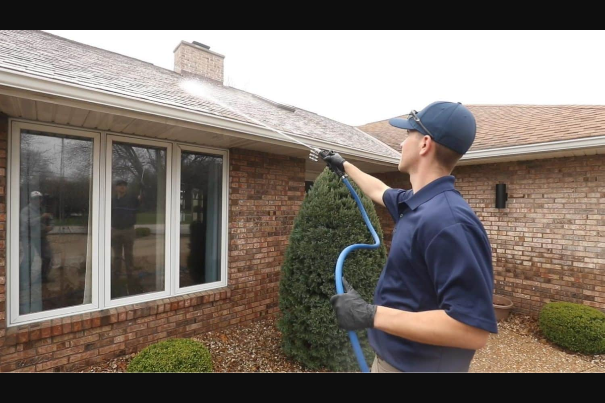 Roof being soft washed to remove black streaks in Marion Ohio